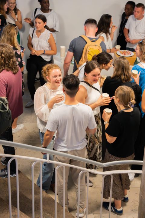 Foyer overview with many young adults